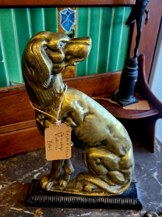 Brass seated hound door portter